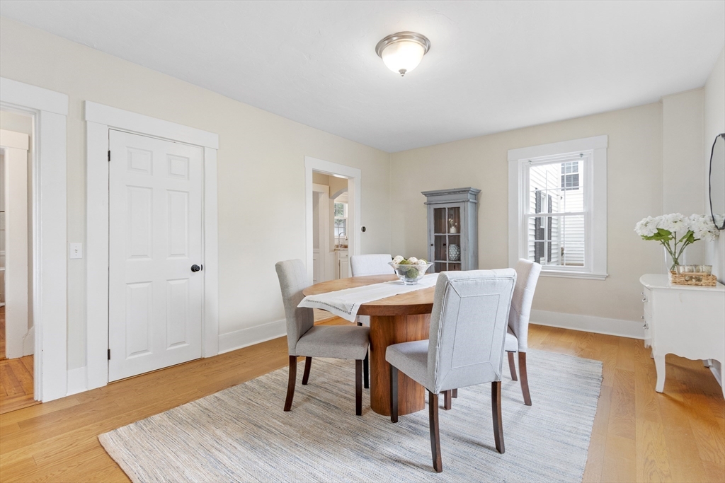 170 West Street, Unit 170 Needham, MA 02494 - Photo 6 of 32 a view of a dining room with furniture and wooden floor
