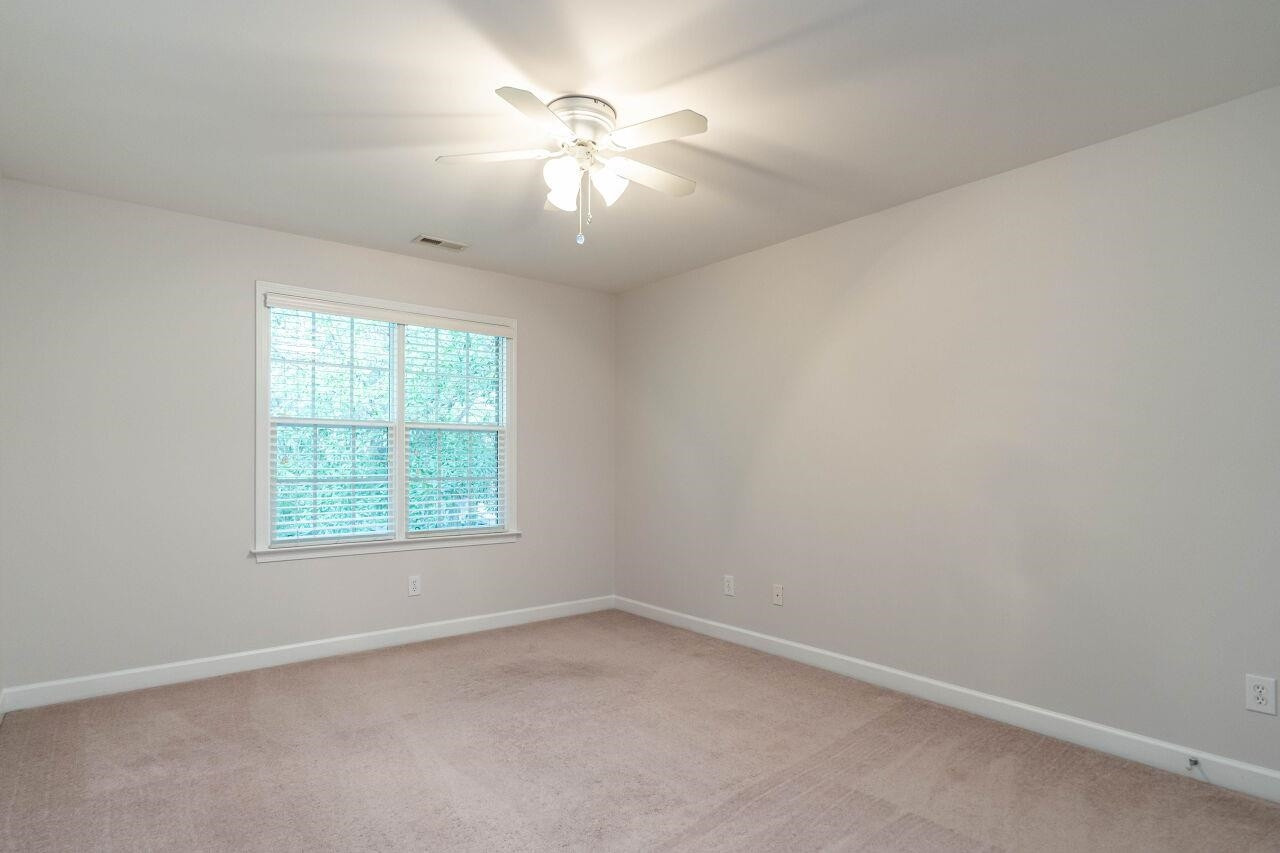 5948 Kohler Lane Raleigh, NC 27616 - Photo 27 of 32 an empty room with a window