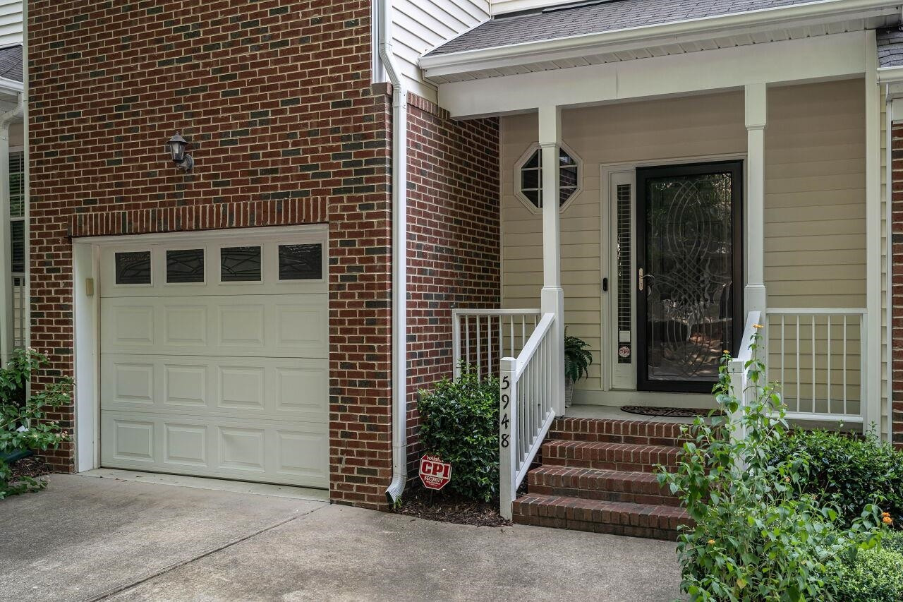 5948 Kohler Lane Raleigh, NC 27616 - Photo 3 of 32 a front view of a house with a yard