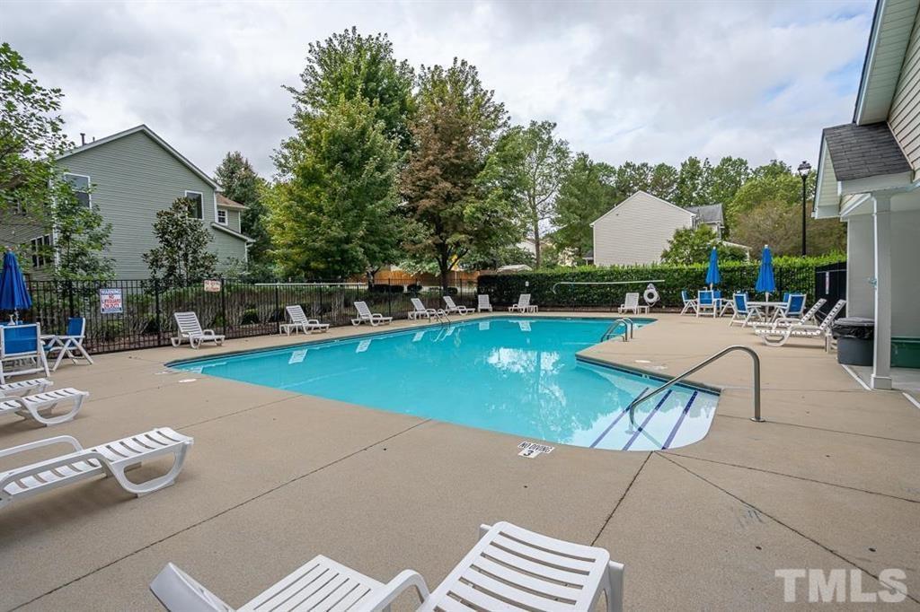 5948 Kohler Lane Raleigh, NC 27616 - Photo 31 of 32 a view of a swimming pool with a patio