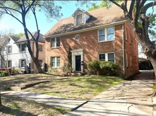 a view of a house with a swimming pool