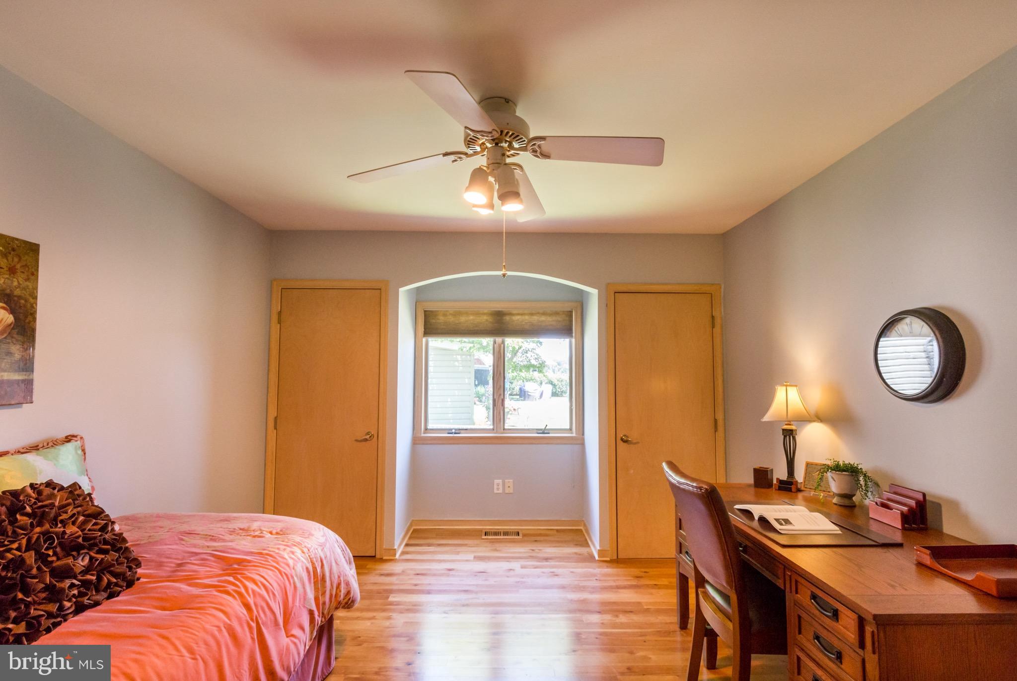6702 Mallard Road Baltimore, MD 21220 - Photo 11 of 27 a bedroom with a bed and a table