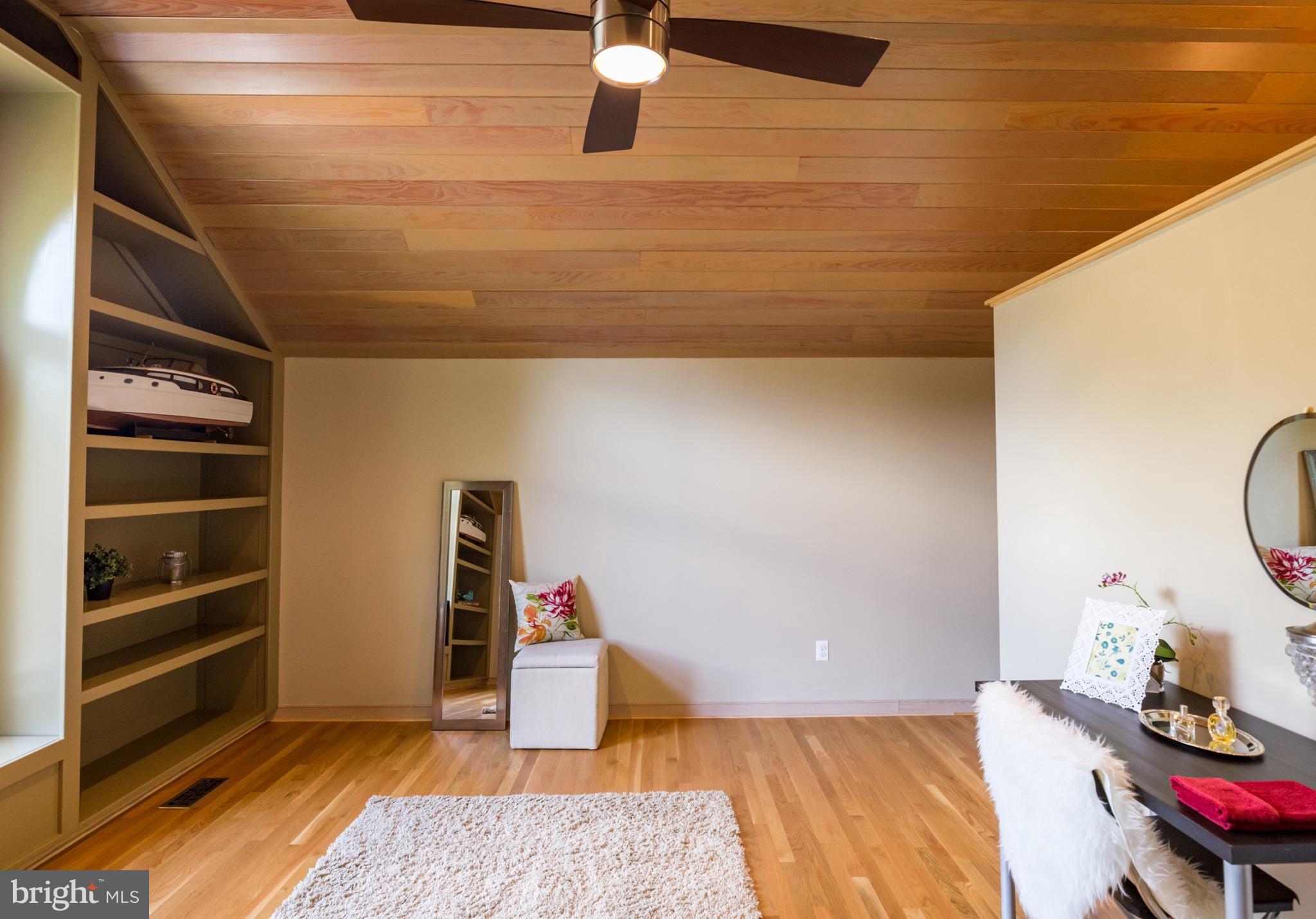 6702 Mallard Road Baltimore, MD 21220 - Photo 20 of 27 a bedroom with a bed and a table