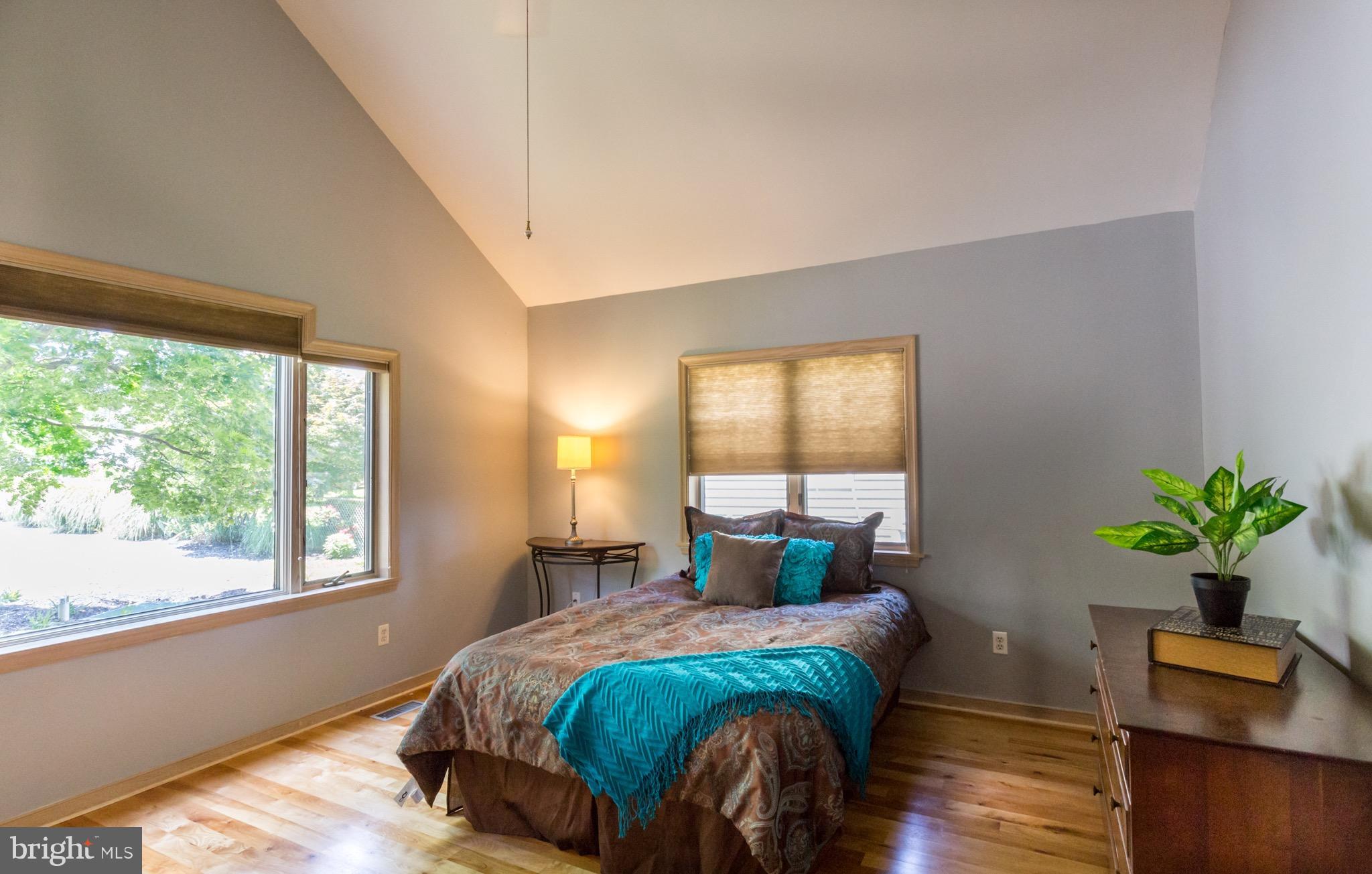 6702 Mallard Road Baltimore, MD 21220 - Photo 8 of 27 a bedroom with a bed and window