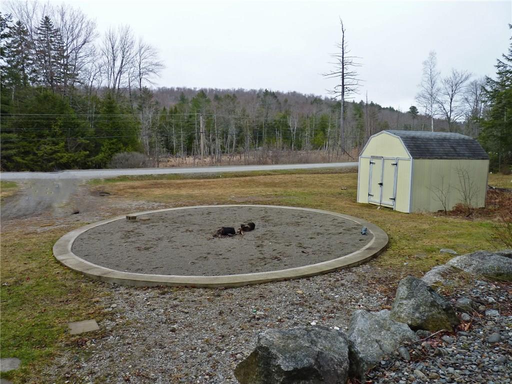 283 Lily Road Dedham, ME 04429 - Photo 21 of 22 Patio/Fire pit area.