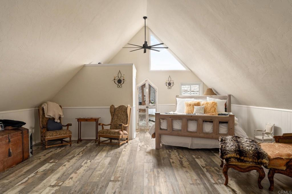 200 Neptune Avenue Encinitas, CA 92024 - Photo 21 of 33 a living room with furniture and wooden floor