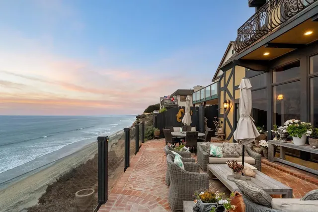 a view of a chairs and tables in the patio