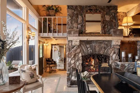 a large kitchen with lots of counter top space and stainless steel appliances