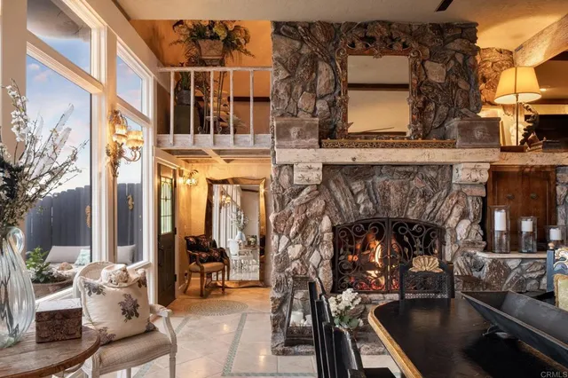 a large kitchen with lots of counter top space and stainless steel appliances