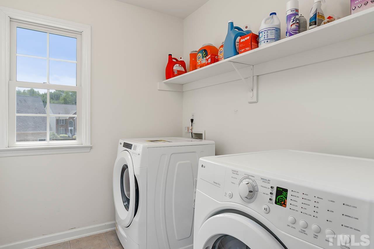 5906 Big Nance Drive Raleigh, NC 27616 - Photo 24 of 40 a utility room with dryer and washer