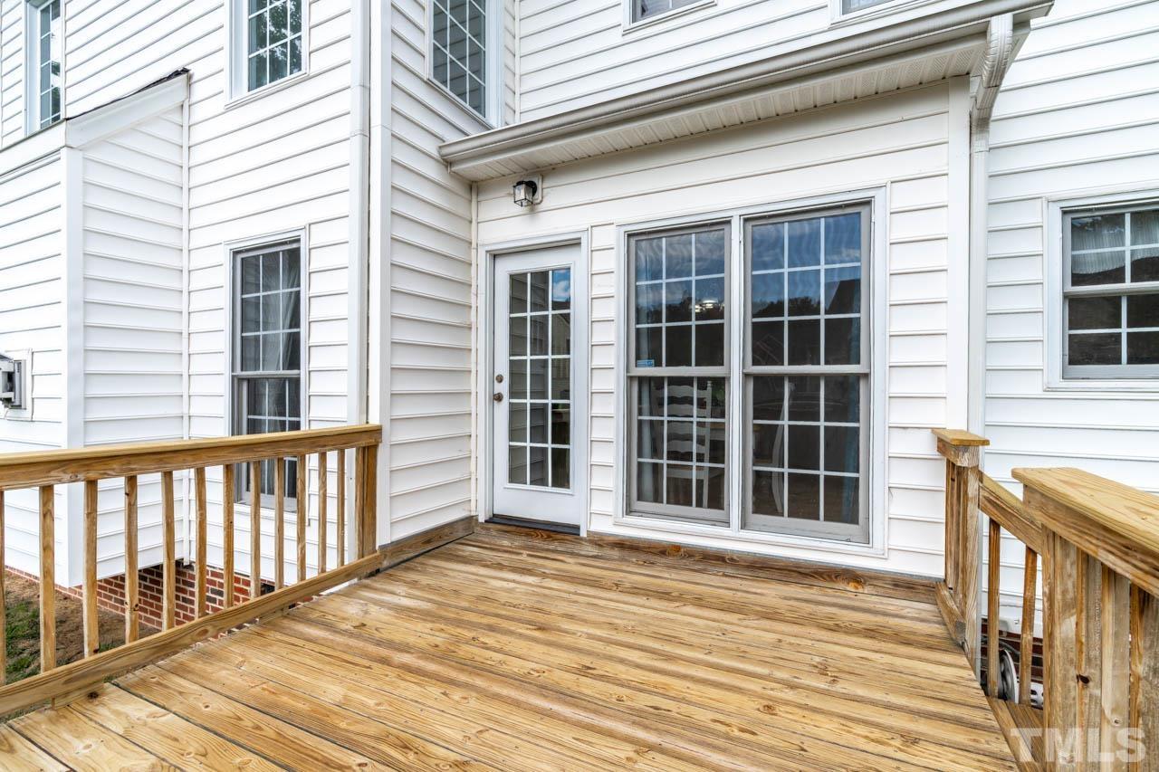 5906 Big Nance Drive Raleigh, NC 27616 - Photo 31 of 40 a view of a balcony with a window