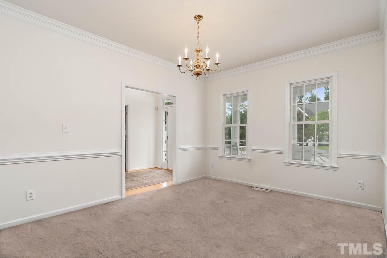 5906 Big Nance Drive Raleigh, NC 27616 - Photo 8 of 40 a view of an empty room with a window
