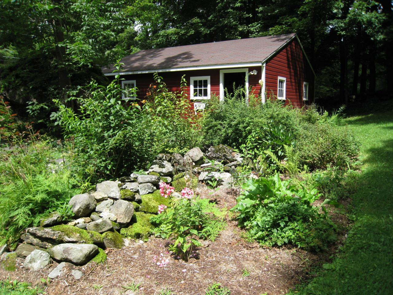 115 West Center Road West Stockbridge, MA 01266 - Photo 18 of 19 a front view of a house with a yard