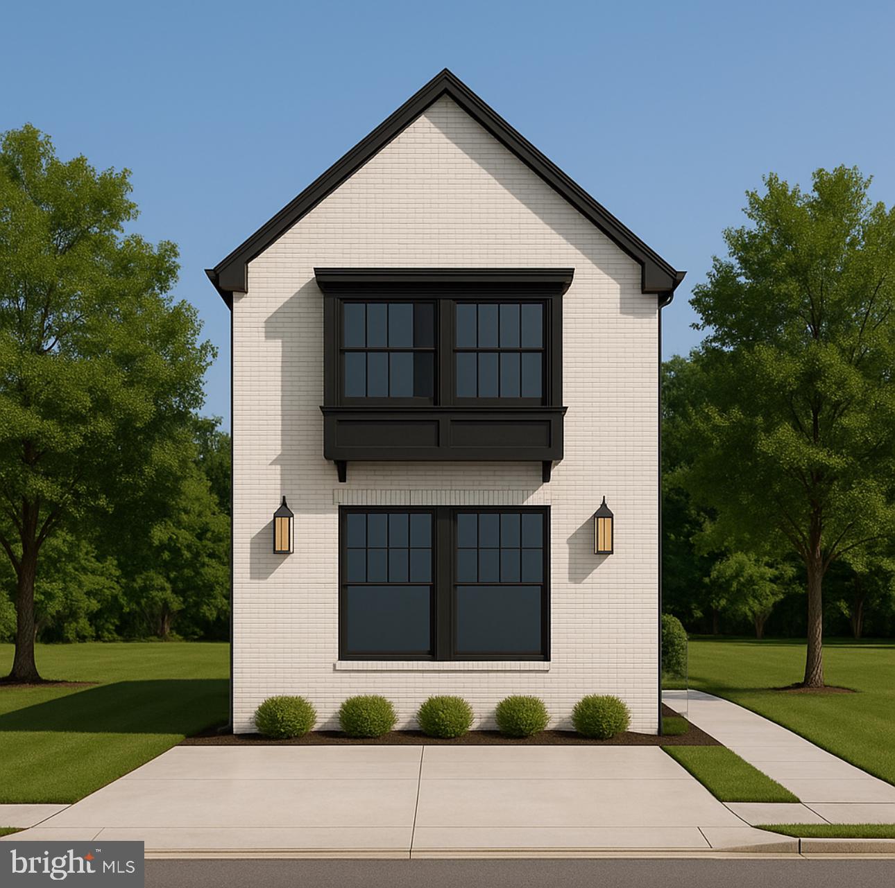 a front view of a house with garage and yard