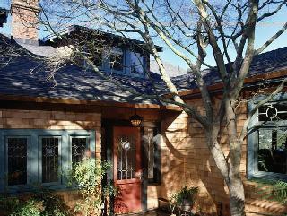 a view of a house with a tree