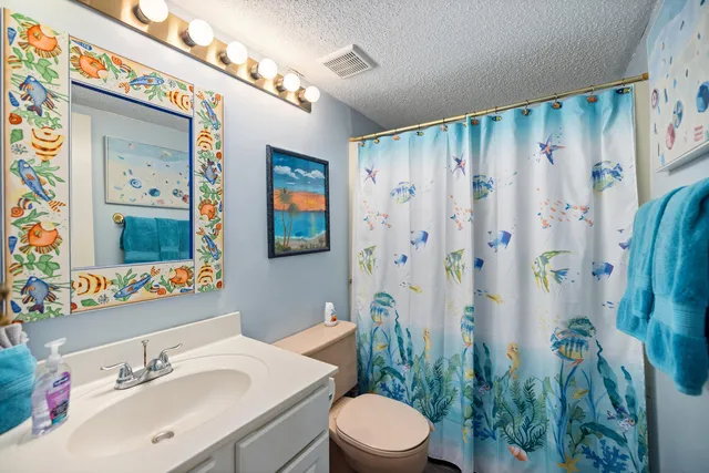 a view of a balcony with furniture