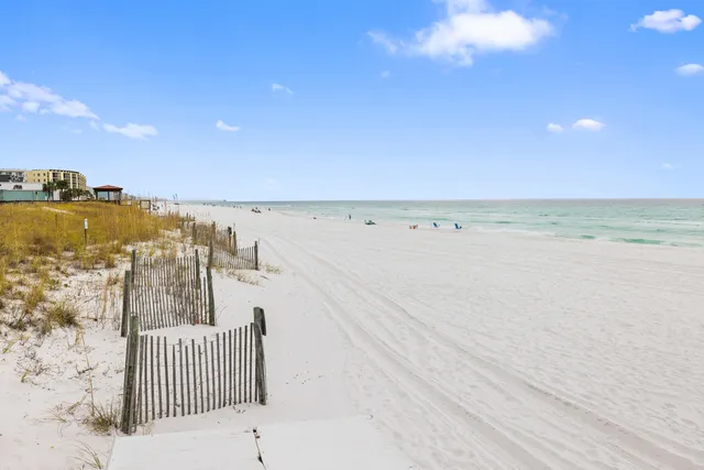 a view of swimming pool with seating space