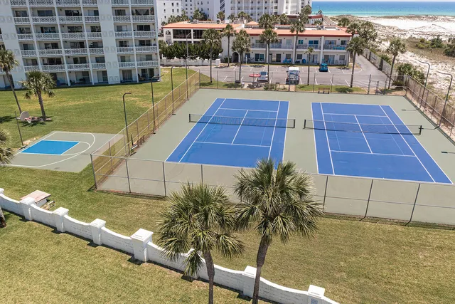a view of a swimming pool and an outdoor space