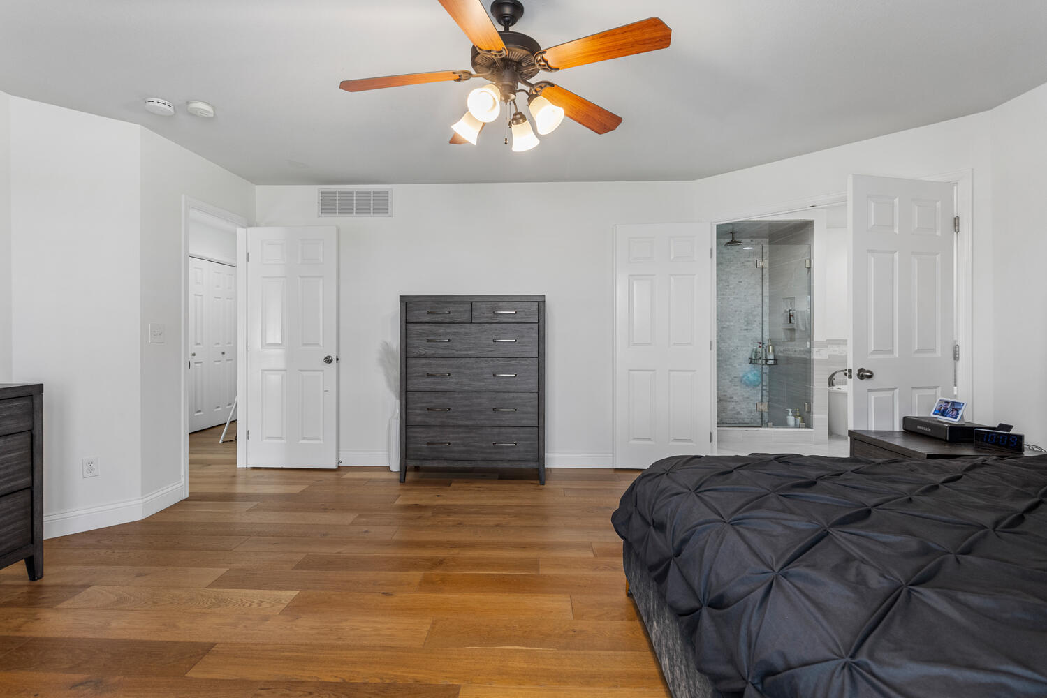 1621 English Oak Drive Champaign, IL 61822 - Photo 14 of 62 a bedroom with a bed and a chandelier