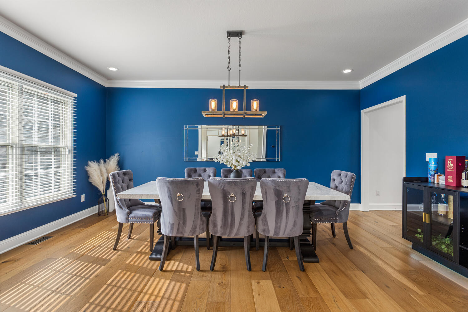 1621 English Oak Drive Champaign, IL 61822 - Photo 19 of 62 a view of a dining room with furniture window and wooden floor