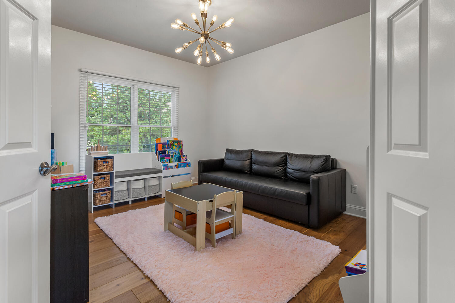 1621 English Oak Drive Champaign, IL 61822 - Photo 22 of 62 a living room with furniture and a chandelier