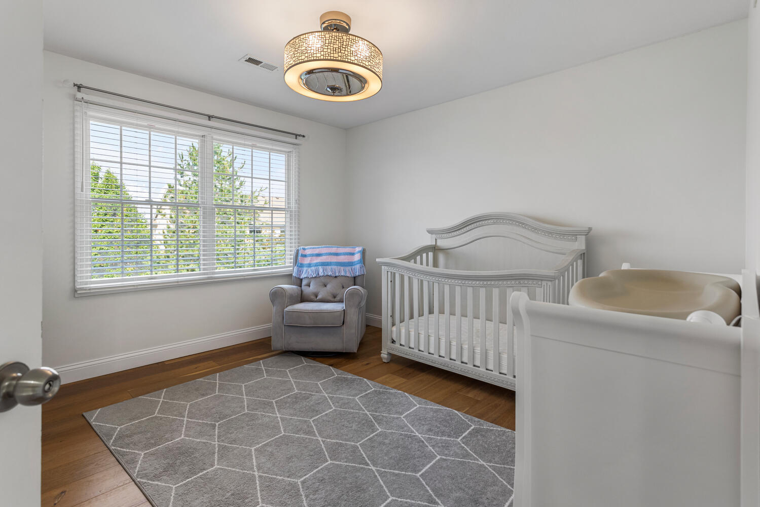 1621 English Oak Drive Champaign, IL 61822 - Photo 30 of 62 a bedroom with furniture and a window