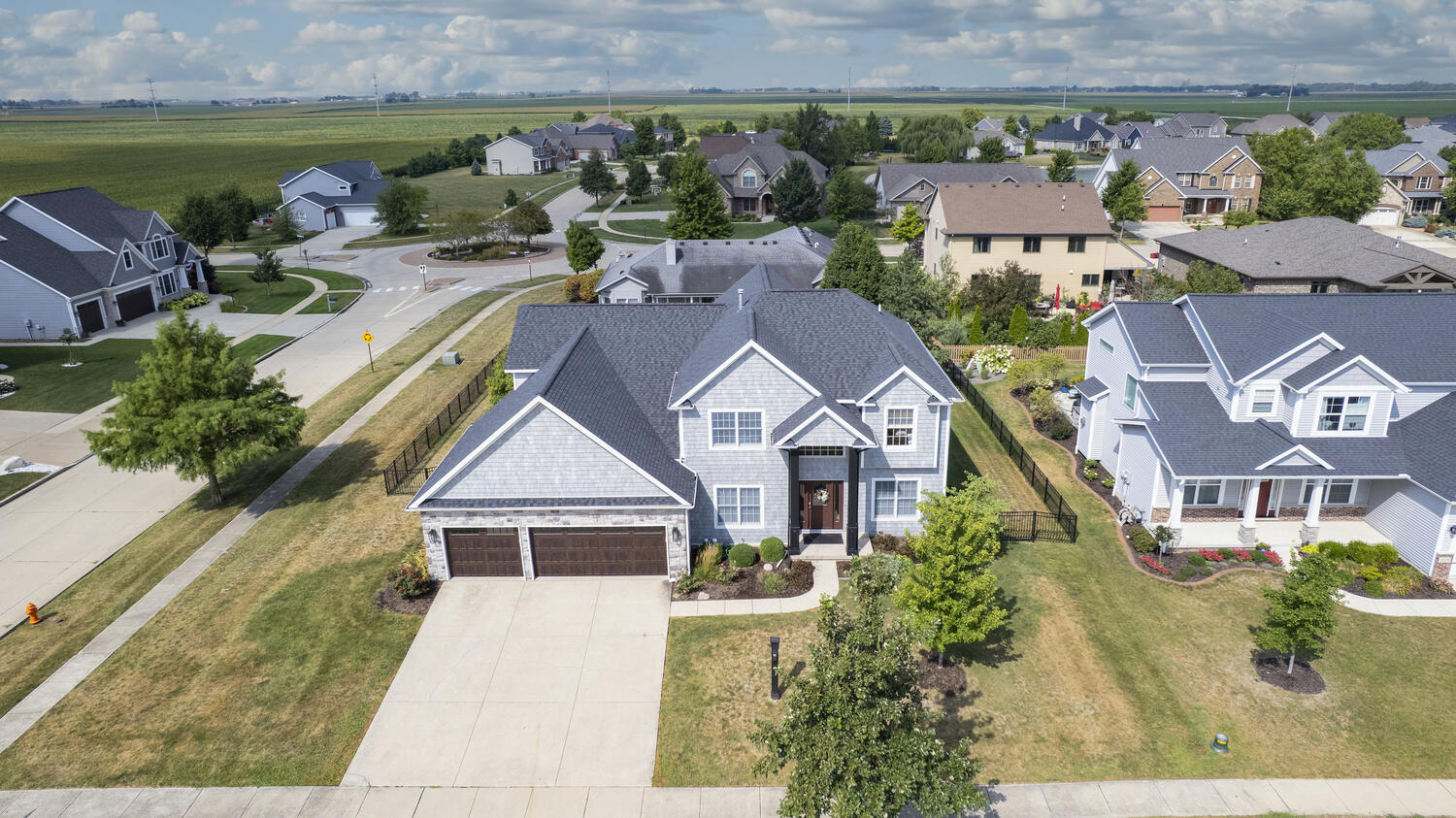 1621 English Oak Drive Champaign, IL 61822 - Photo 51 of 62 an aerial view of a house with a yard