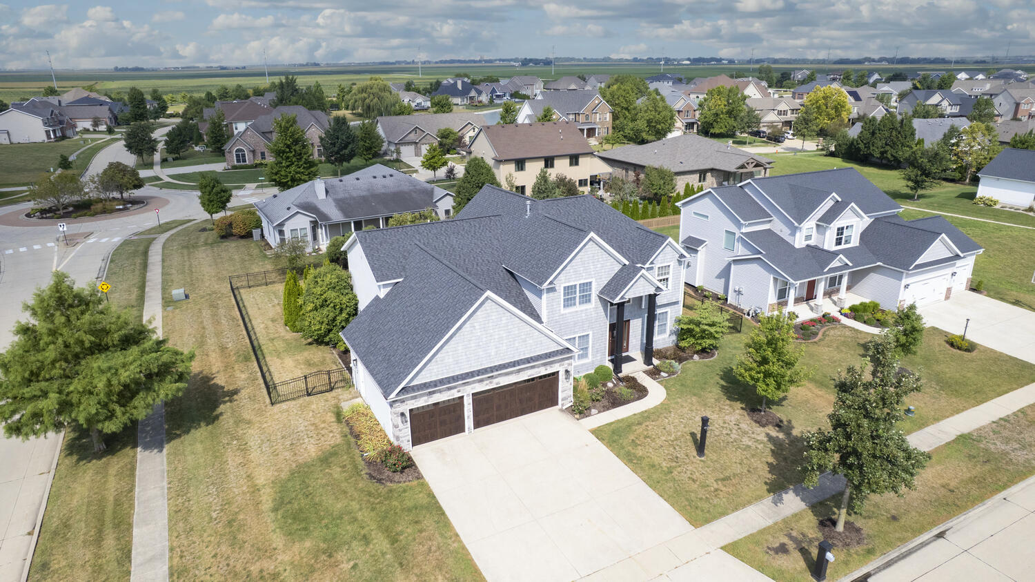 1621 English Oak Drive Champaign, IL 61822 - Photo 52 of 62 an aerial view of a house with a yard