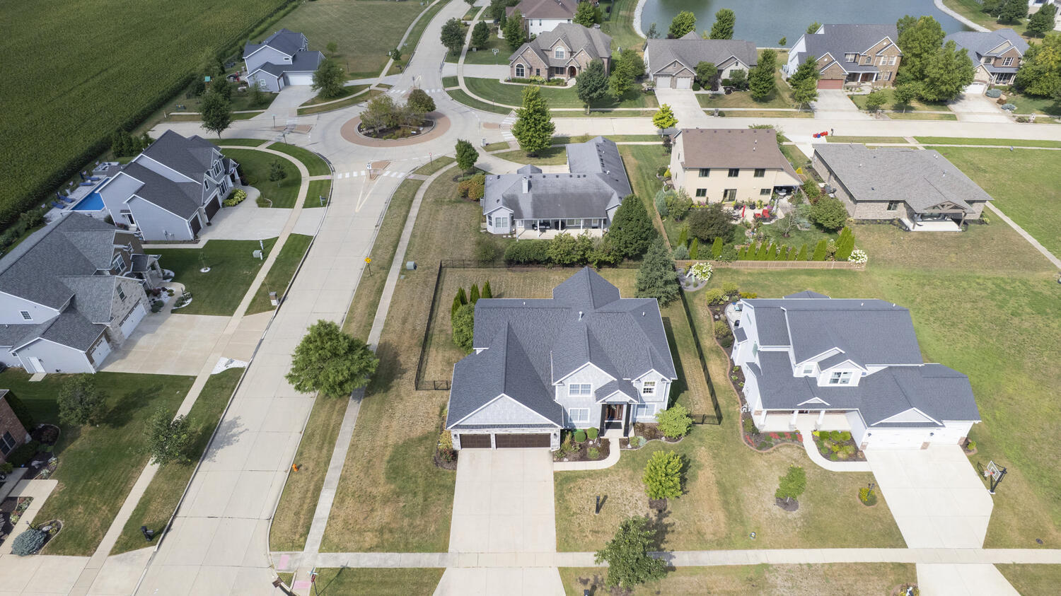 1621 English Oak Drive Champaign, IL 61822 - Photo 53 of 62 an aerial view of a house with a swimming pool