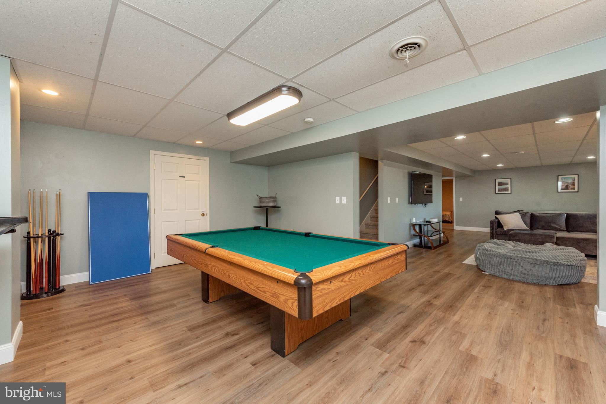 2828 Glendale Road Swanton, MD 21561 - Photo 42 of 78 a room with pool table and wooden floor