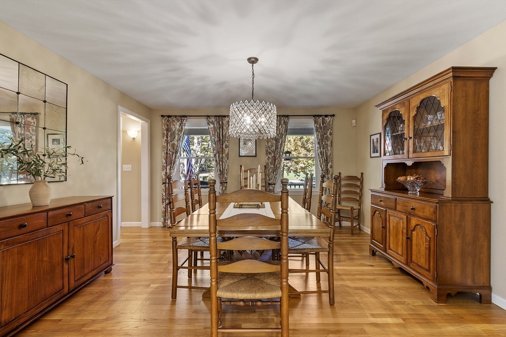 4 Celestial Way Pepperell, MA 01463 - Photo 21 of 41 a view of a dining room with furniture window and wooden floor