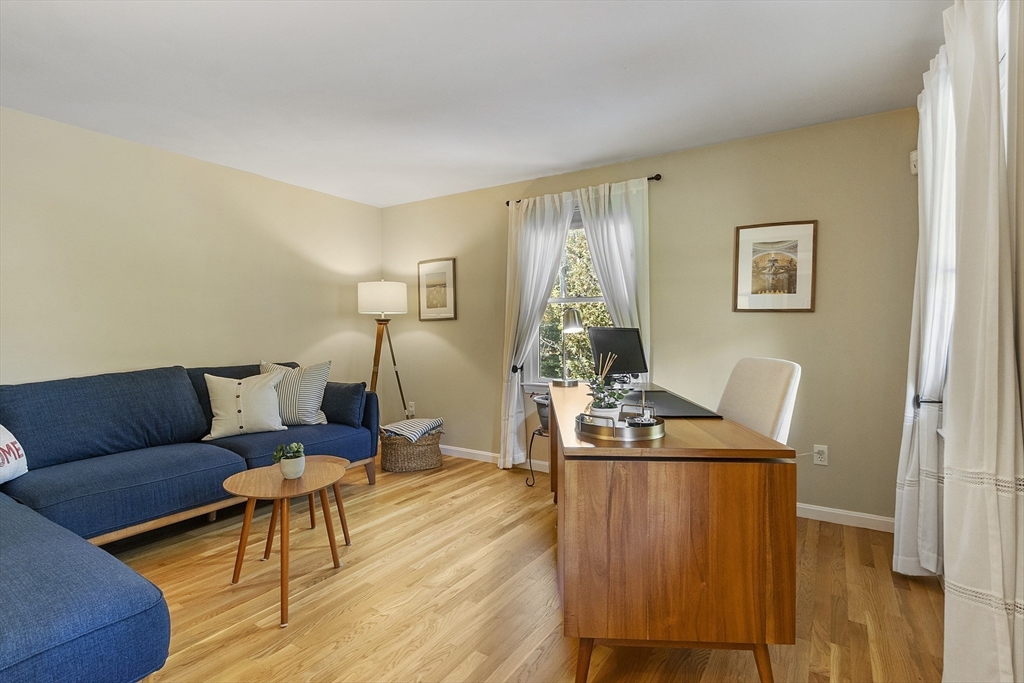 4 Celestial Way Pepperell, MA 01463 - Photo 22 of 41 a living room with furniture and wooden floor
