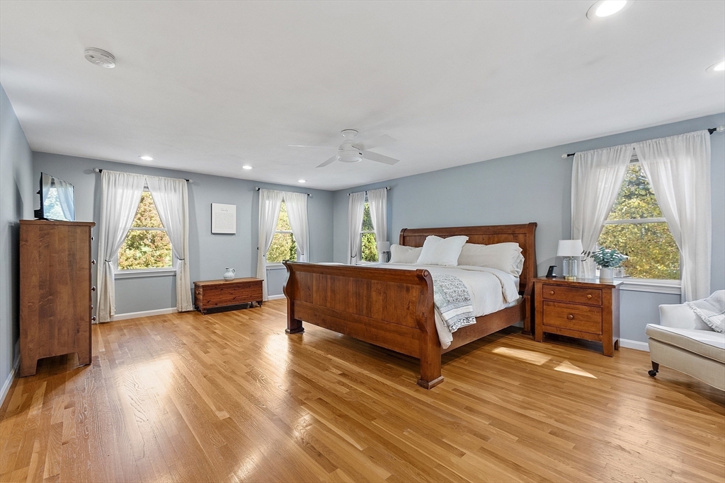 4 Celestial Way Pepperell, MA 01463 - Photo 23 of 41 a bedroom with a bed window and a couch