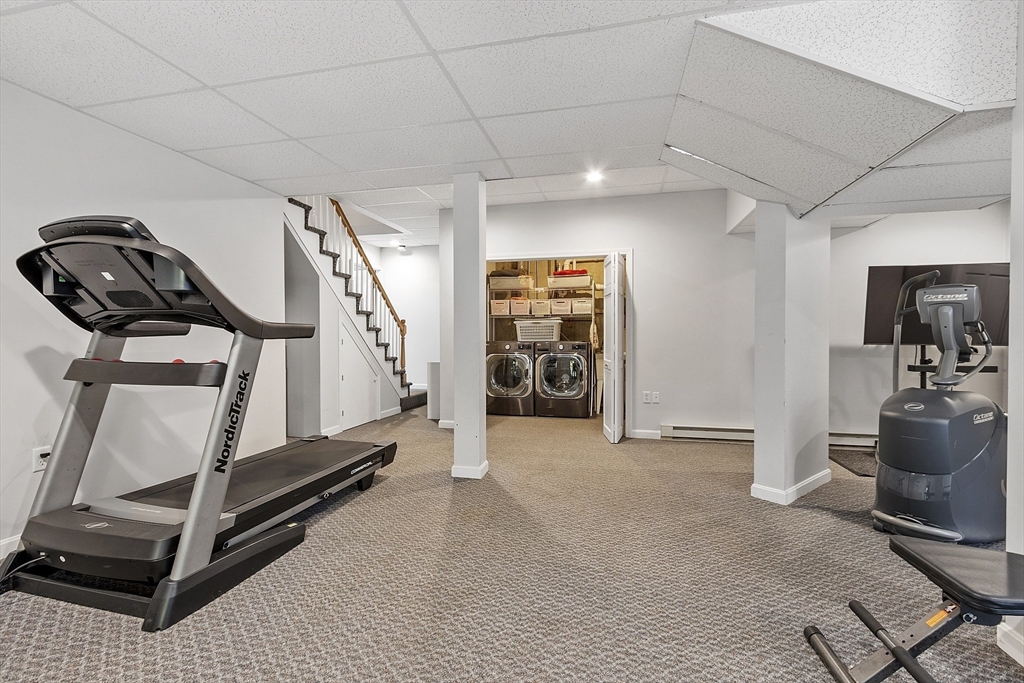4 Celestial Way Pepperell, MA 01463 - Photo 33 of 41 a view of a room with gym equipment