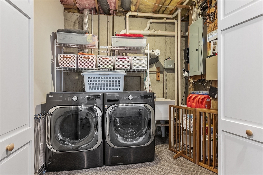 4 Celestial Way Pepperell, MA 01463 - Photo 35 of 41 a utility room with fridge dryer and washer
