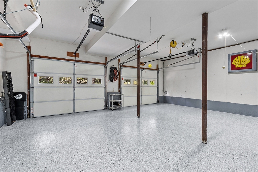 4 Celestial Way Pepperell, MA 01463 - Photo 37 of 41 a view of a garage with furniture