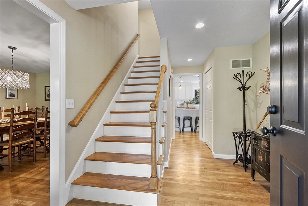 4 Celestial Way Pepperell, MA 01463 - Photo 6 of 41 a view of entryway and hall with wooden floor