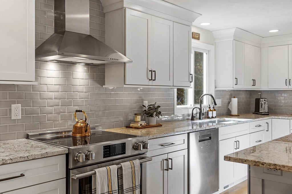 4 Celestial Way Pepperell, MA 01463 - Photo 7 of 41 a kitchen with a sink and cabinets