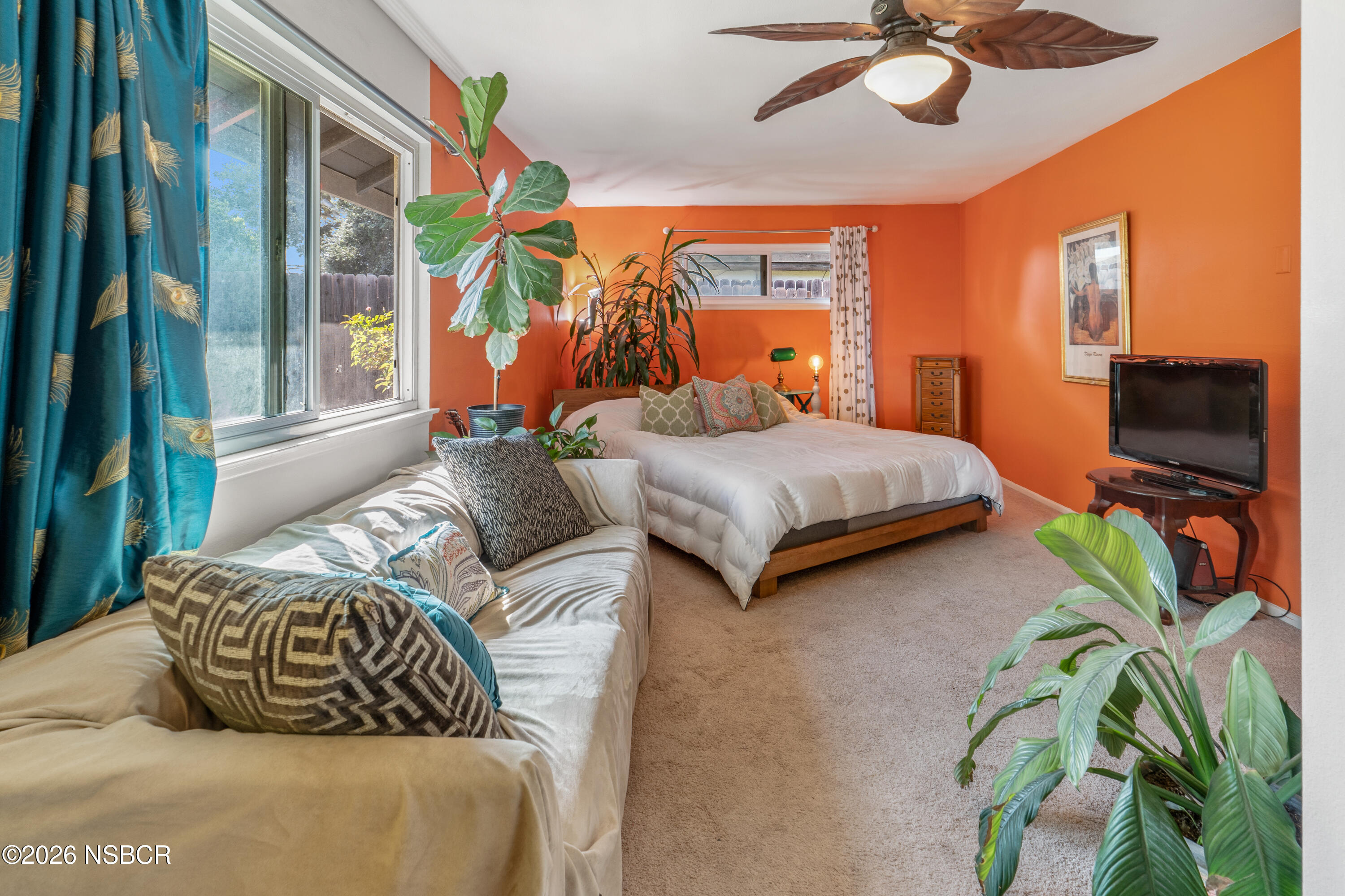 4220 Constellation Road Lompoc, CA 93436 - Photo 19 of 22 a bedroom with two beds and a chandelier