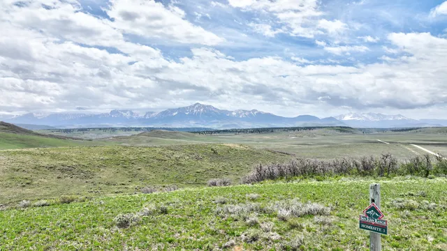 a view of a lake with a big yard