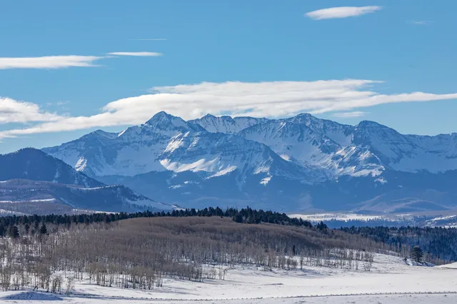 a view of a lake with a mountain