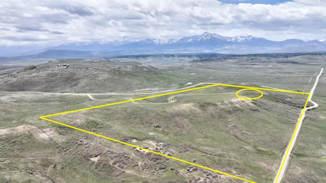 a view of a swimming pool with an ocean view