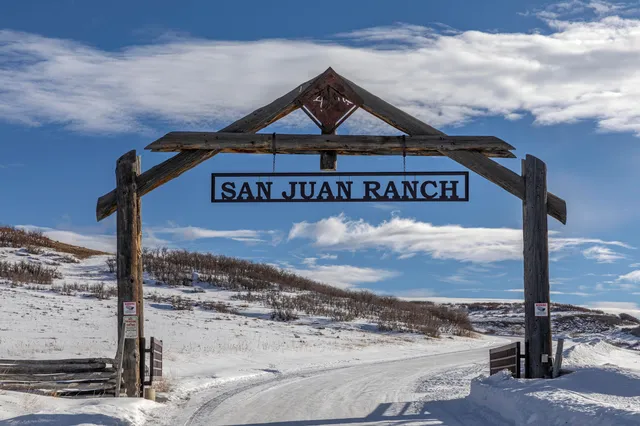 a sign on the side of a street