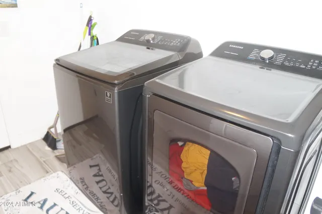 a utility room with dryer and washer
