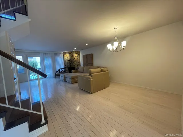 a view of backyard with deck and wooden floor