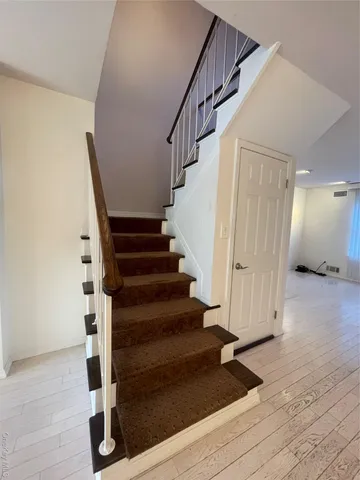 a view of a livingroom with wooden floor