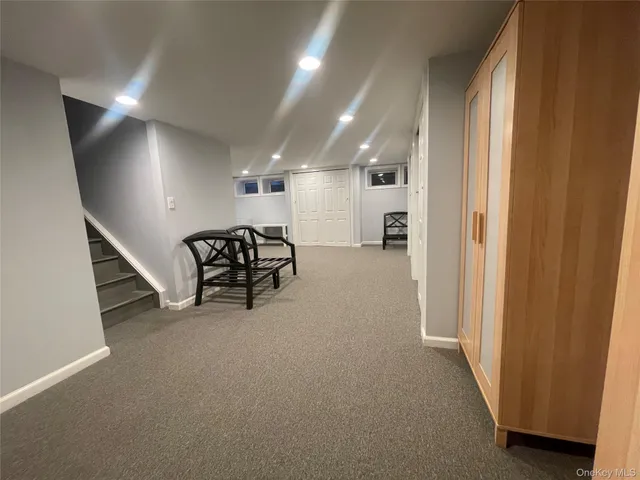 a view of a livingroom with chairs