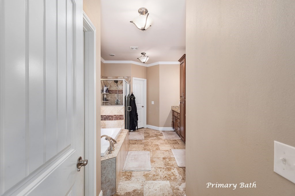 1171 Old Ewing Road Lufkin, TX 75901 - Photo 22 of 49 a bathroom with a bathtub and shower