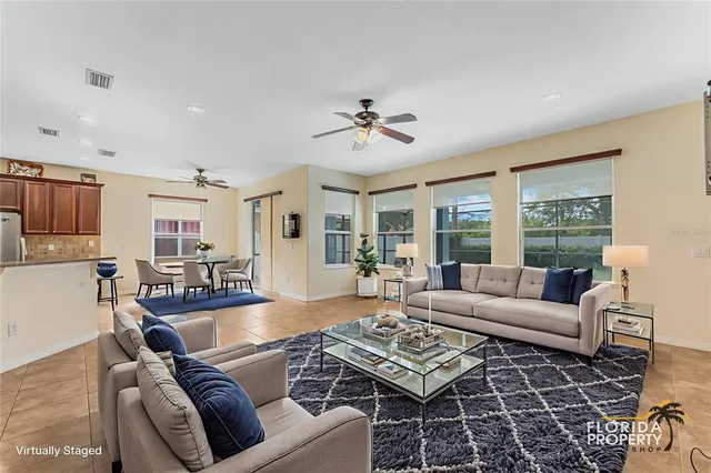 a view of a kitchen with refrigerator and a sink
