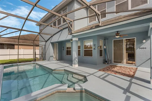 a view of a house with a swimming pool